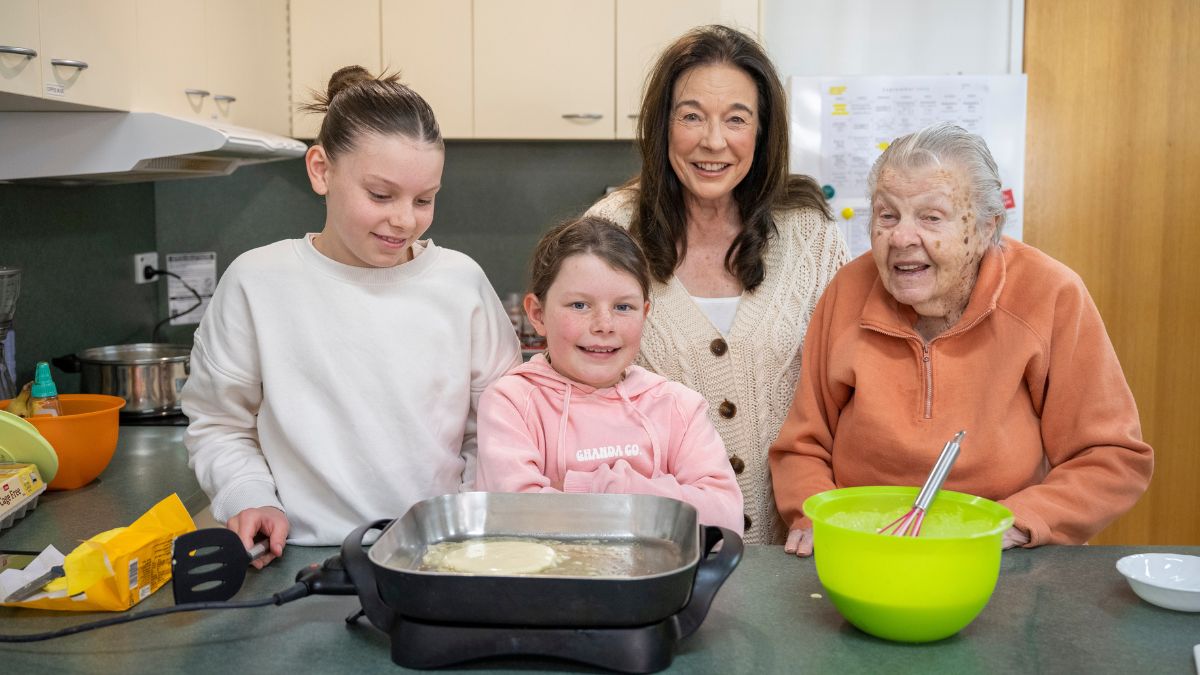 Roseview resident Melva Gale makes pancakes with members of her extended family for The Memory Kitchen cookbook in Crystal Brook.